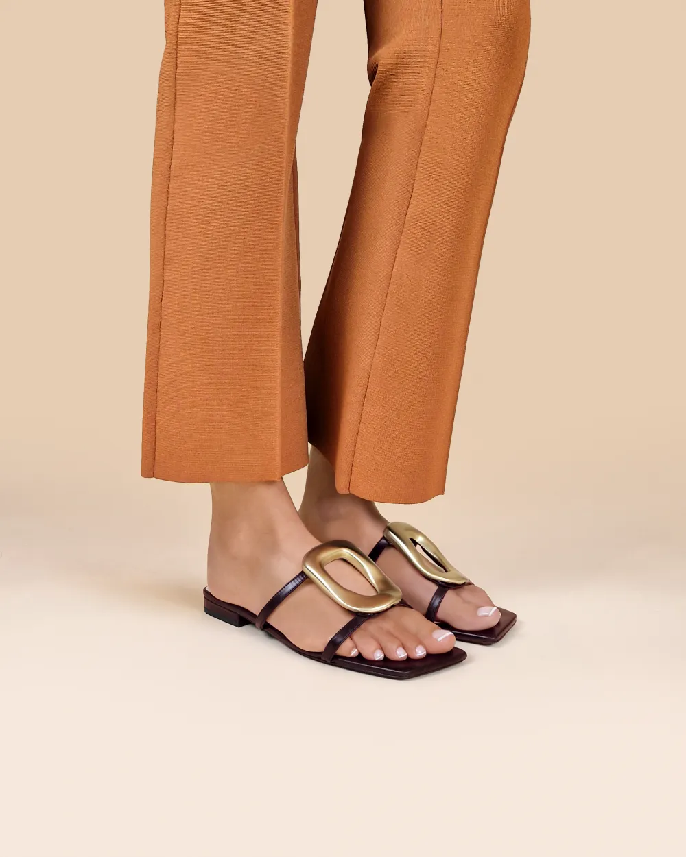 Kos Chocolate Flat Sandals with Golden Ornament