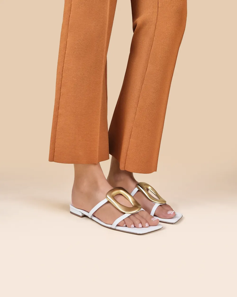 Kos White Flat Sandals with Golden Ornament